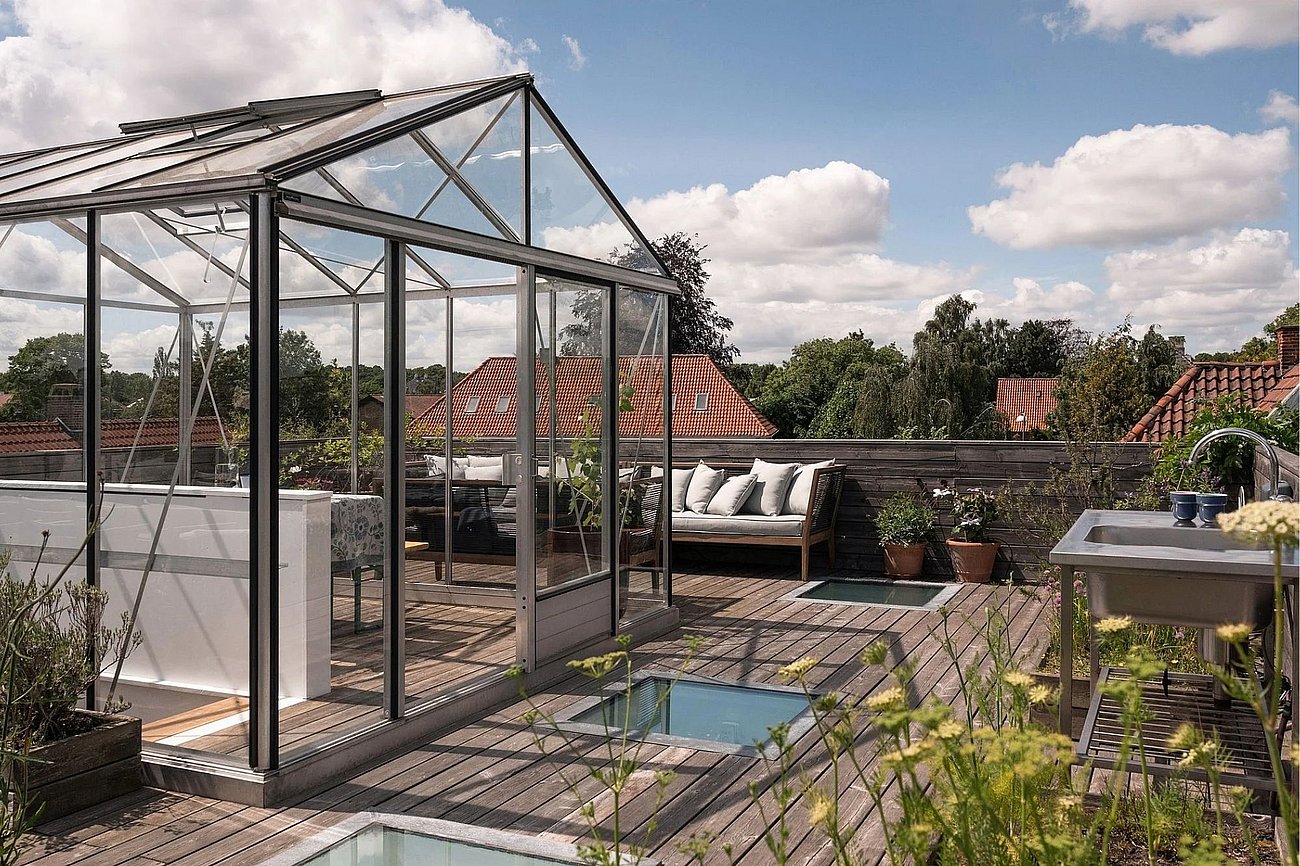 Tagterrasse med orangeri på funkisvilla
