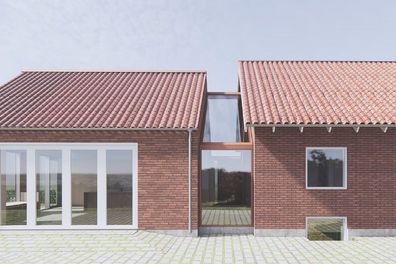 Glasbygning som overgang til tilbygning til murermestervilla fra 50'erne