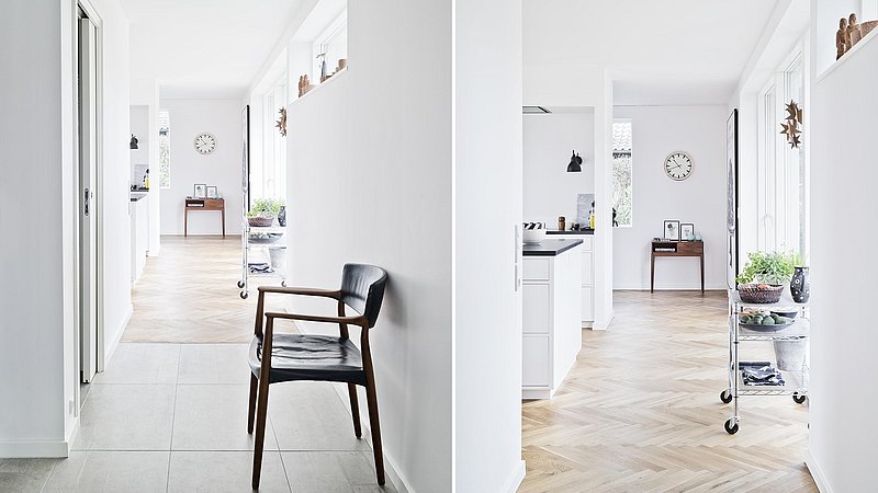 Husets nye køkken er placeret midt i parcellen med fri udsigt til haven. m4 Arkitekter