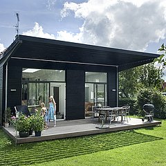 Tilbygning gav himmellys og havekig fra 1930'er bungalowen