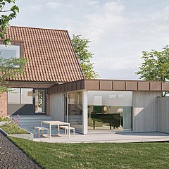 En harmonisk trætilbygning med musik i til denne 50'er villa